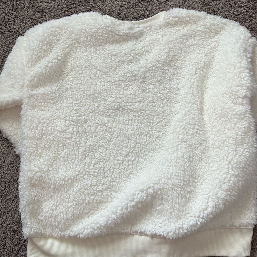 Fluffy sweater. Brand New, never worn.